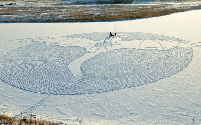 This Snow Artist Jogs All Day To Create A Dragon Mural