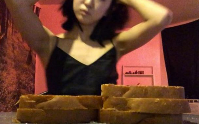 Best Blog Ever:  Mysterious Woman Films Herself Smashing Her Face Into Every Type Of Bread