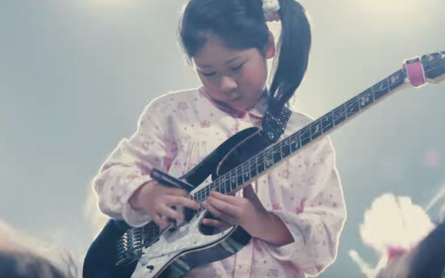 11-Year-Old Guitar Japanese Prodigy Uses Debit Card As A Pick In Headbanging Performance