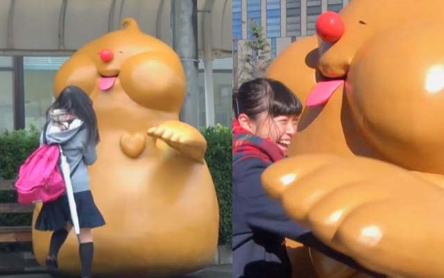 Japan’s Candy Mascot Kinda Looks Like Poop, But That Won’t Stop Him From Hugging 7 Billion People