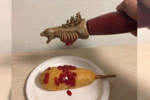 Japanese Twitter User Made A Gory Ketchup Head Out Of A Godzilla Capsule Toy