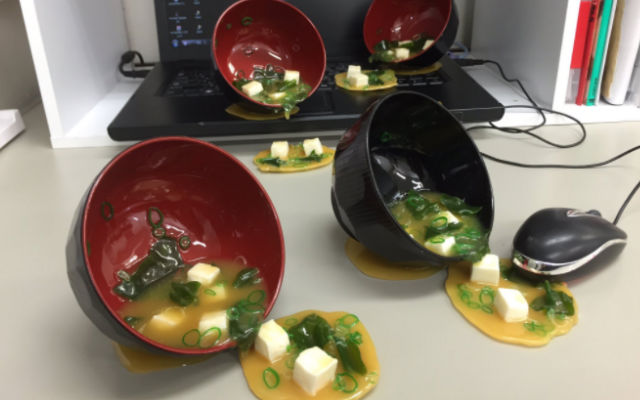 Give The Illusion Of A Lunchtime Mishap With Spilled Miso Soup Smartphone Stands