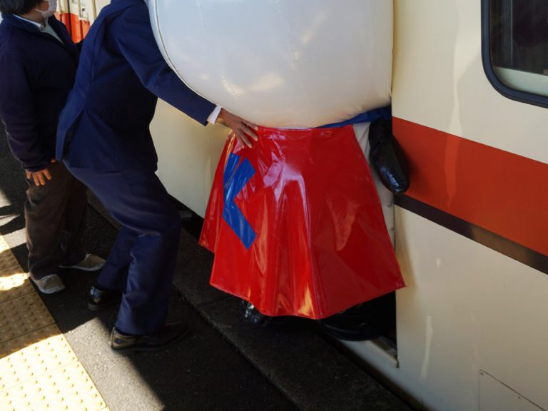 Japanese train staff’s hospitality extends to mascots with giant heads