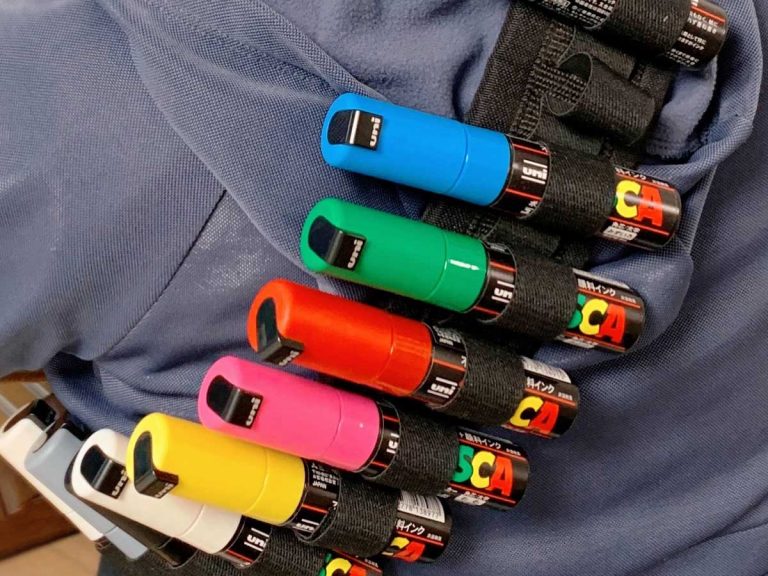 Japanese hobbyist’s wife looks totally badass storing paint markers in a shotgun ammo sling