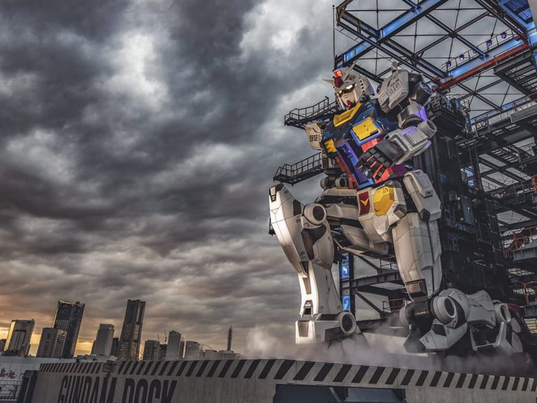 Dramatic images of life-sized Gundam in Japan rising up on a backdrop of dark clouds go viral