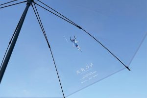 Japanese service lends “Weathering with You” clear umbrellas with Hina floating in the sky