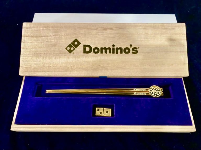 Domino’s awarding lucky customer with 18-karat gold chopsticks for their new overflowing pizza series