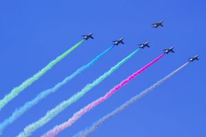 Japan’s Blue Impulse aerobatic team skywrites colorful Olympic rings over the skies of Tokyo