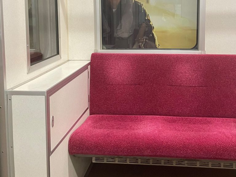 Japanese train station convinces commuters that Tom Cruise is staring at them