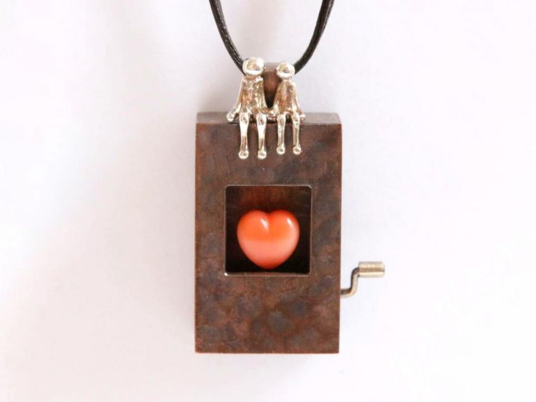 Japanese artist’s charming wind-up necklace will set your heart aflutter