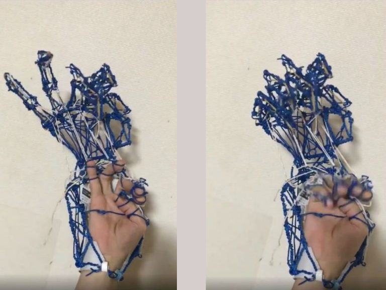 Man creates awesome responsive robotic double hand out of bands and wires